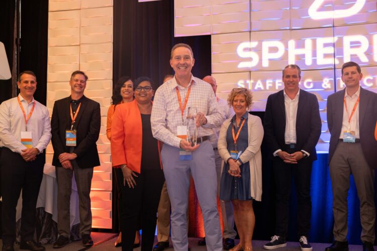 Williamsport franchise accepts award at conference